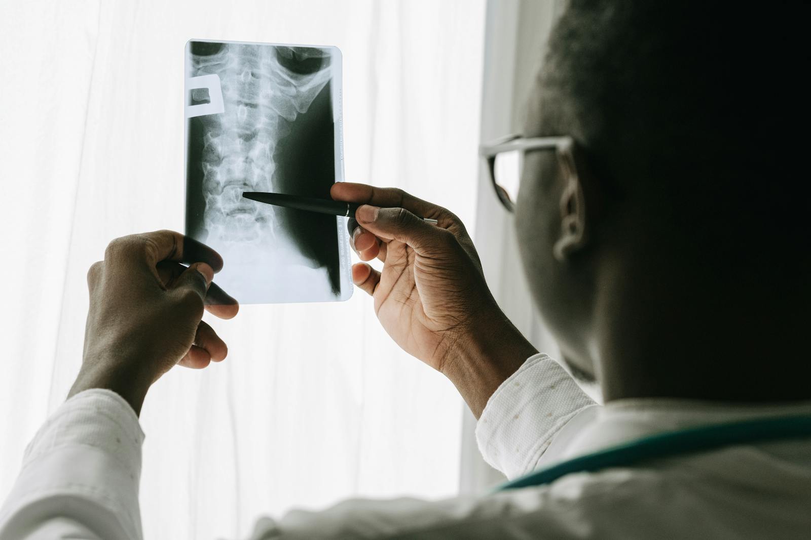 A Doctor Looking at an X-ray